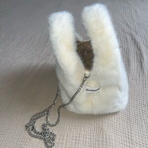 White Faux Fur Skinsquared clutch